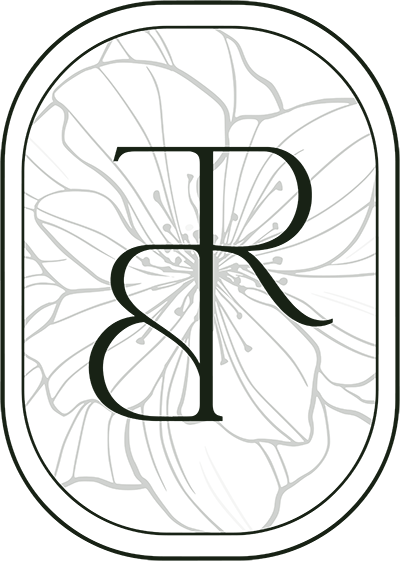 Decorative logo with stylized letters 'TRB' on a floral background